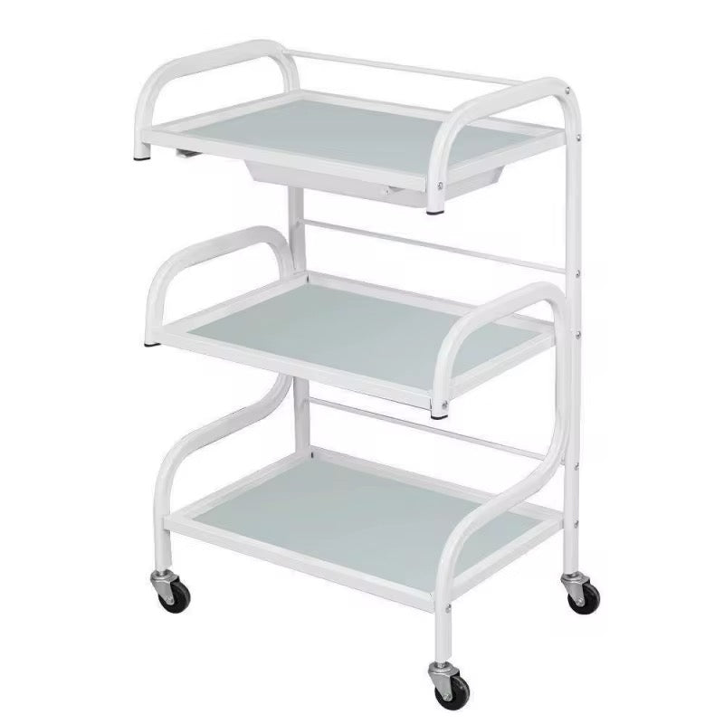 White metal serving cart with three shelves on a white background
