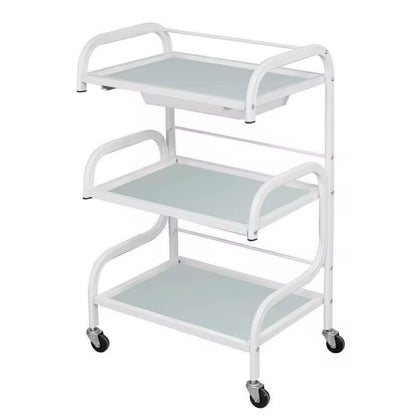 White metal serving cart with three shelves on a white background