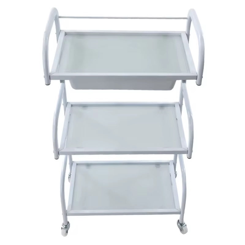 White metal serving cart with three shelves on a white background