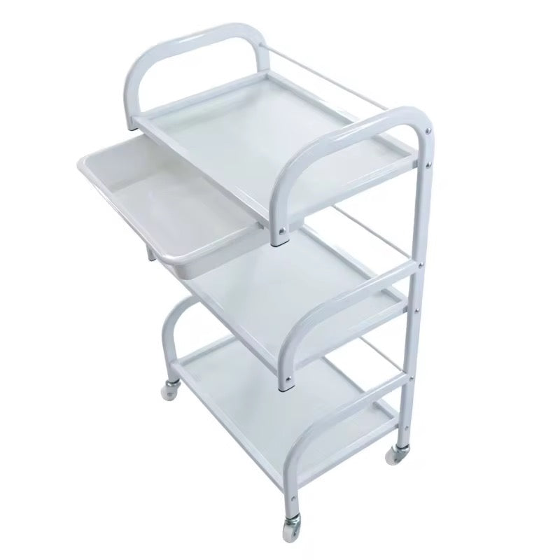 White metal serving cart with three shelves on a white background