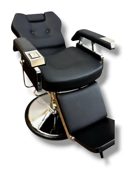 Black barber chair with reclining seat on a white background